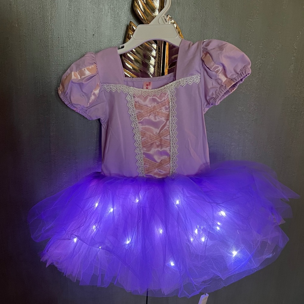 Light up Rapunzel onesie dress. Size 100 (Chinese sizing) it’s a 2/3 US.